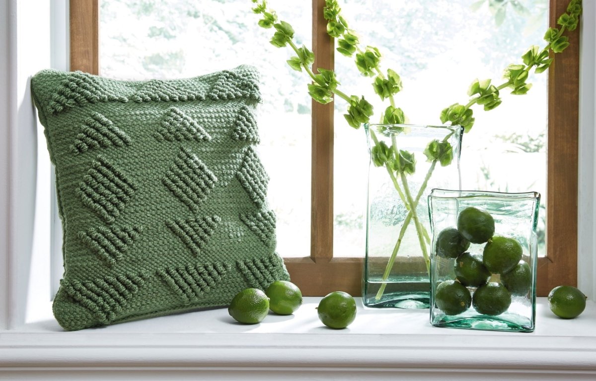 Rustingmere - Pillow Throw Pillows by Signature Design by Ashley® - Walls Furniture & Mattress