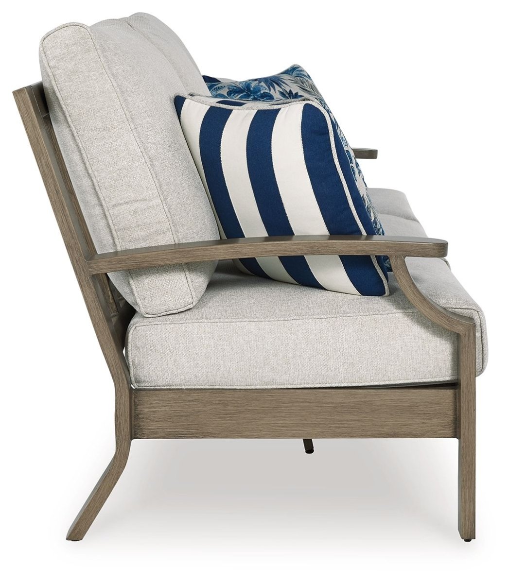 Rainier Ranch - Sofa With Cushion - Brown / Beige Sofas by Signature Design by Ashley® - Walls Furniture & Mattress