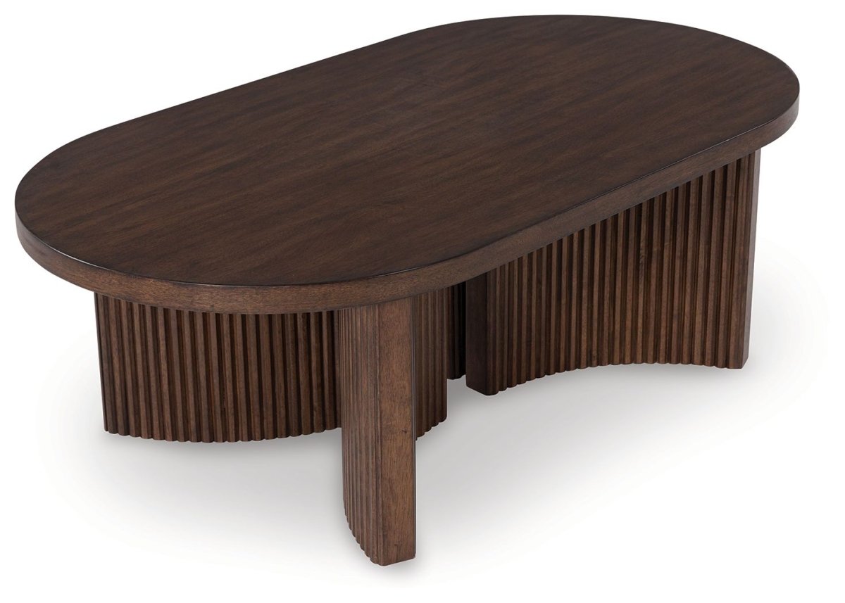 Korestone - Oval Cocktail Table - Dark Brown Coffee Tables by Signature Design by Ashley® - Walls Furniture & Mattress