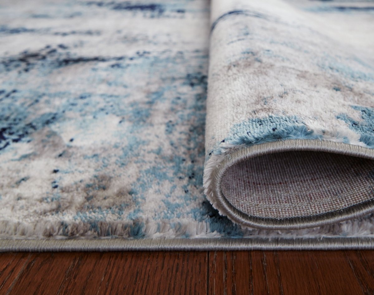Leonelle - Rug Area Rugs by Signature Design by Ashley® - Walls Furniture & Mattress