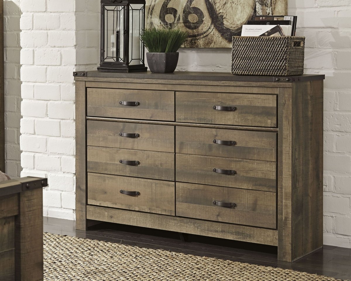 Trinell - Six Drawer Dresser - 61.34" x 15.98" x 42.99" - Brown Dark Dressers by Signature Design by Ashley® - Walls Furniture & Mattress