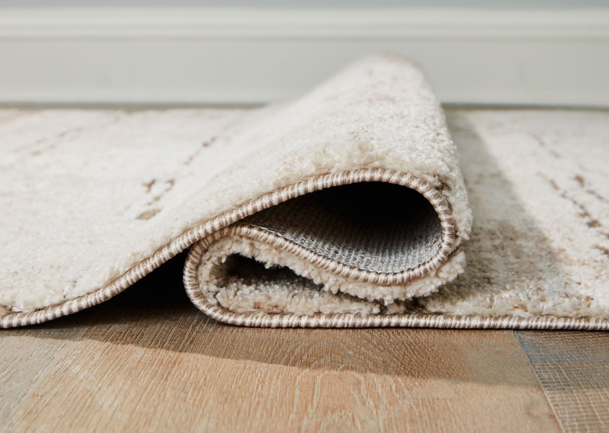 Kasney - Rug Area Rugs by Signature Design by Ashley® - Walls Furniture & Mattress
