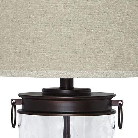 Tailynn - Glass Table Lamp - Clear / Bronze Finish Table Lamps by Signature Design by Ashley® - Walls Furniture & Mattress