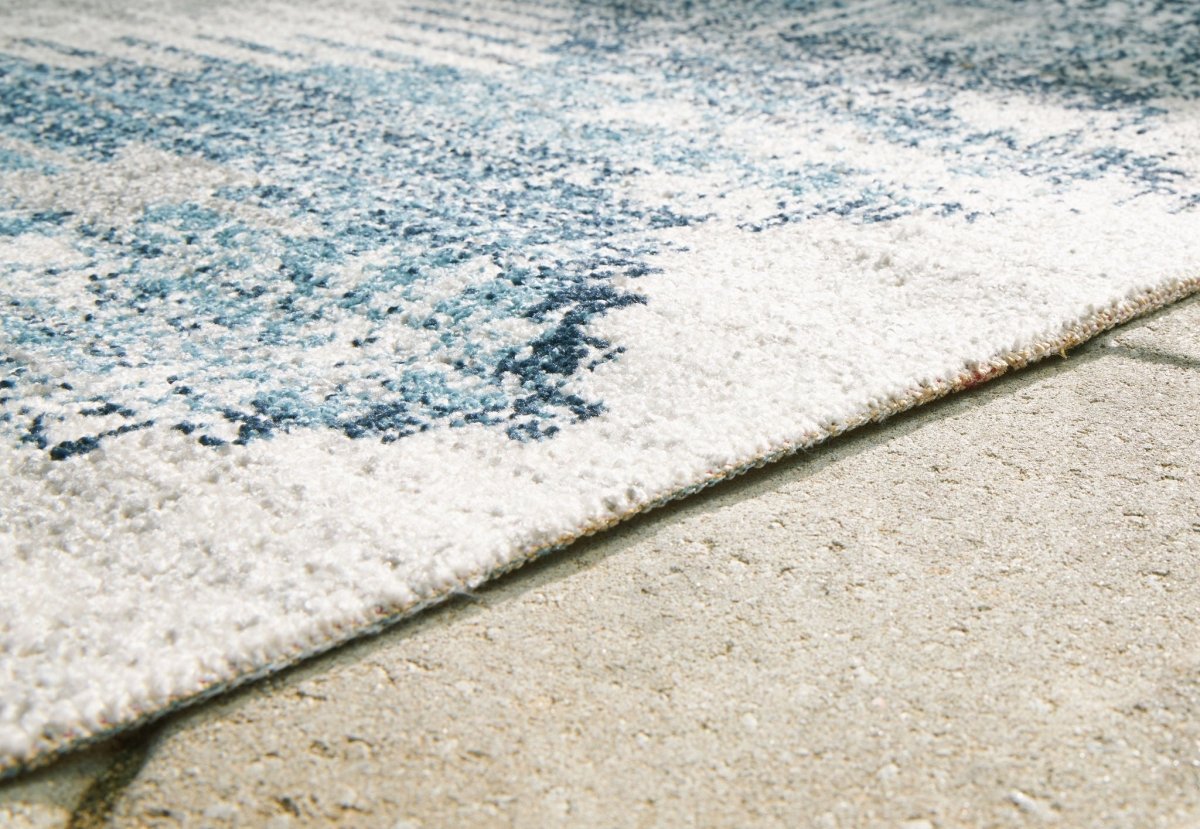 Daddridge - Rug Indoor/Outdoor Rugs by Signature Design by Ashley® - Walls Furniture & Mattress