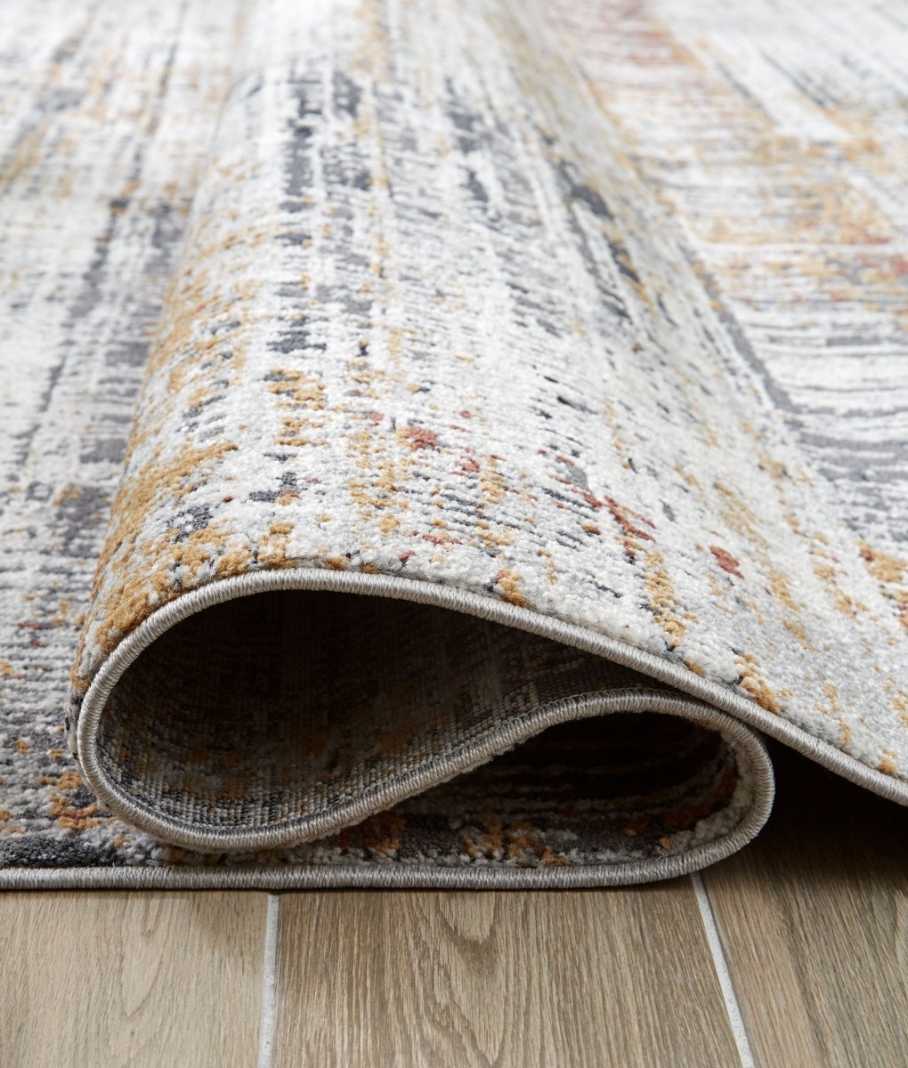 Rhettner - Rug Area Rugs by Signature Design by Ashley® - Walls Furniture & Mattress