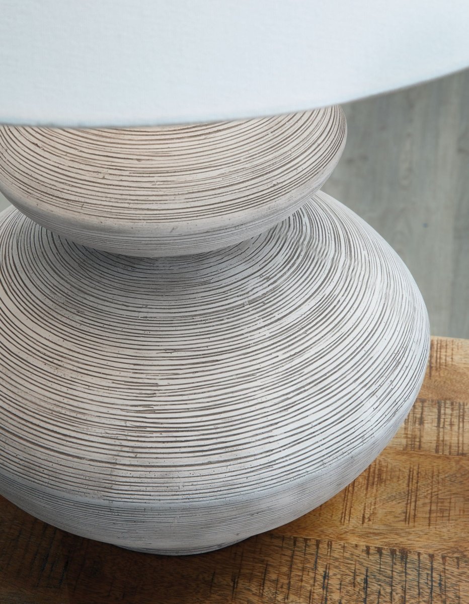 Brickdon - Poly Table Lamp - Distressed White Table Lamps by Signature Design by Ashley® - Walls Furniture & Mattress