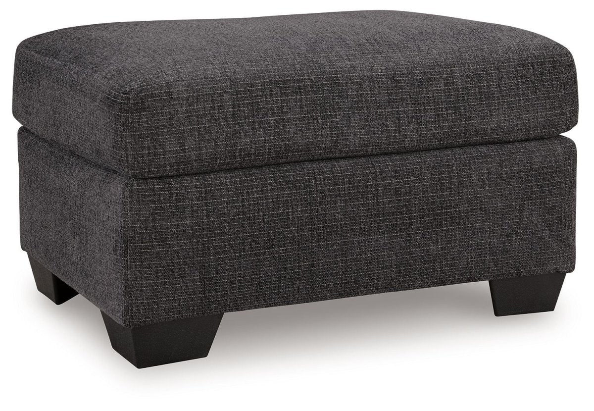 Loreo - Ottoman - Ebony Upholstered Ottomans by Benchcraft® - Walls Furniture & Mattress