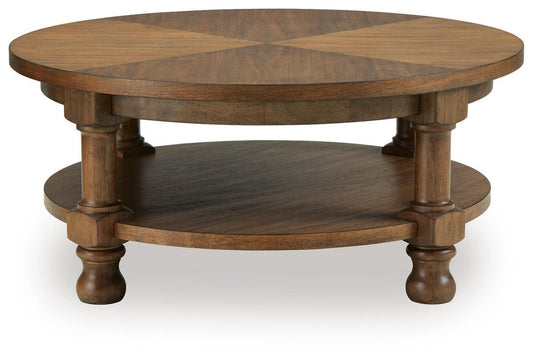 Chadworth - Round Cocktail Table - Medium Brown Coffee Tables by Signature Design by Ashley® - Walls Furniture & Mattress
