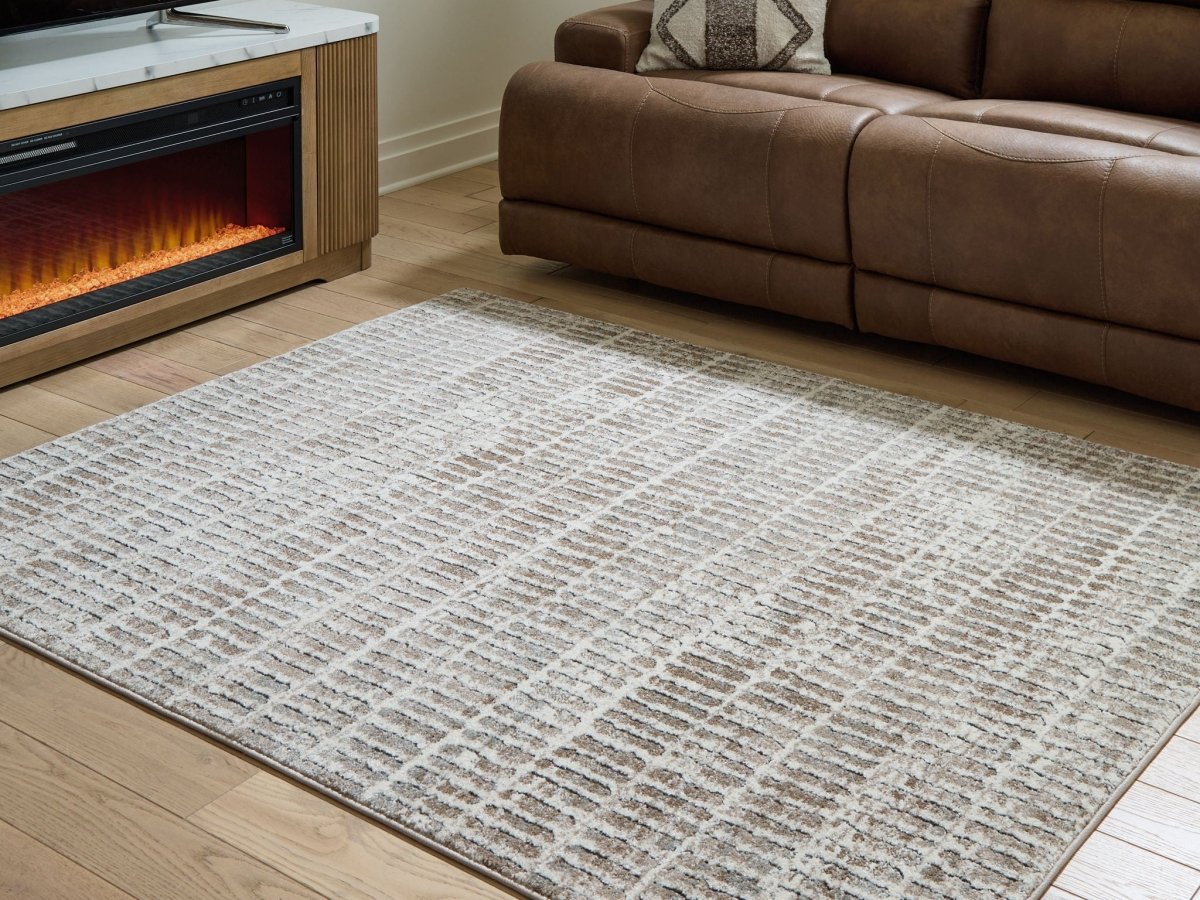 Fuadwick - Rug Area Rugs by Signature Design by Ashley® - Walls Furniture & Mattress