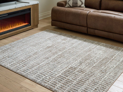 Fuadwick - Rug Area Rugs by Signature Design by Ashley® - Walls Furniture & Mattress