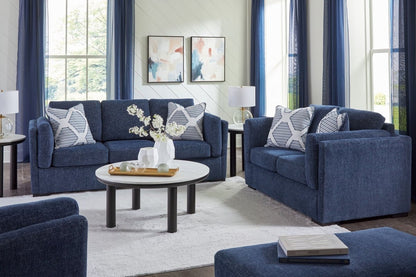 Evansley - Living Room Set Stationary Chair & Ottoman by Benchcraft® - Walls Furniture & Mattress