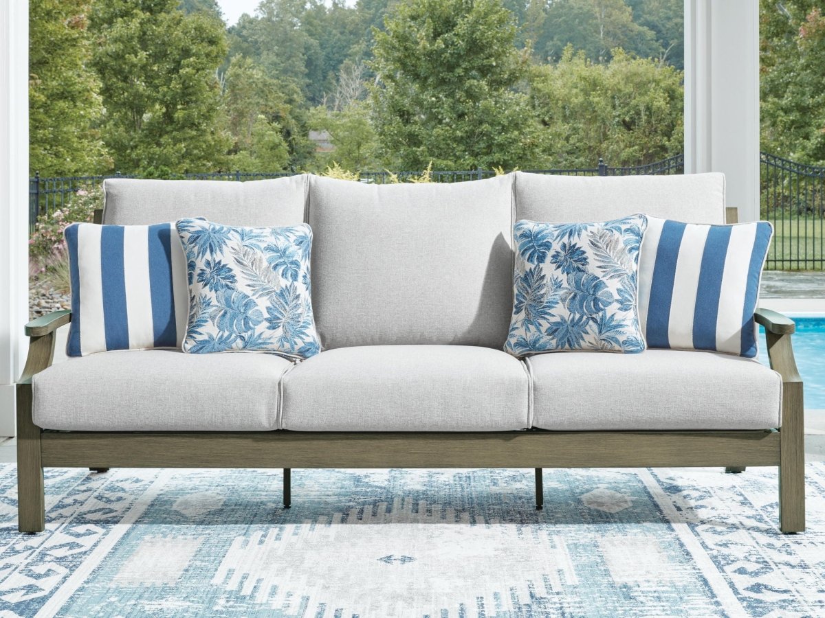 Rainier Ranch - Sofa With Cushion - Brown / Beige Sofas by Signature Design by Ashley® - Walls Furniture & Mattress