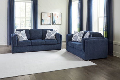 Evansley - Living Room Set Stationary Chair & Ottoman by Benchcraft® - Walls Furniture & Mattress