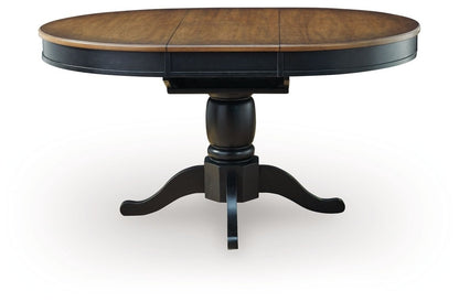 Clorazi - Oval Dining Room Butterfly Extension Table - Black / Brown Dining Tables with Extensions by Signature Design by Ashley® - Walls Furniture & Mattress
