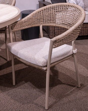 Orchard Beach - Beige - Arm Chair With Cushion (Set of 4) Chair Sets by Signature Design by Ashley® - Walls Furniture & Mattress