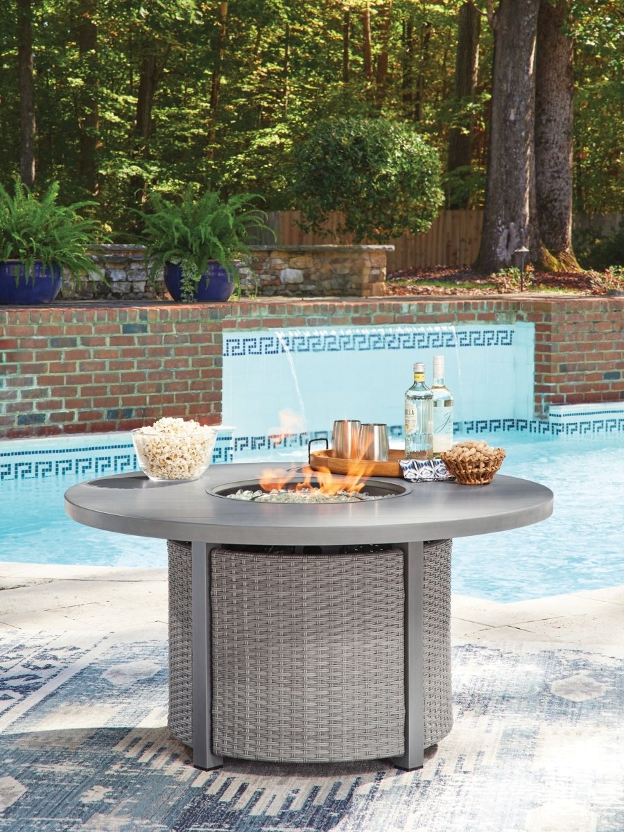 Half Moon Beach - Round Fire Pit Table - Gray Fire Pits by Signature Design by Ashley® - Walls Furniture & Mattress
