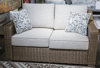 Laguna Heights - Beige - Loveseat With Cushion Loveseats by Signature Design by Ashley® - Walls Furniture & Mattress