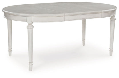Montelaine - Dining Room Extension Table Set 6 Piece Dining Room Sets by Benchcraft® - Walls Furniture & Mattress