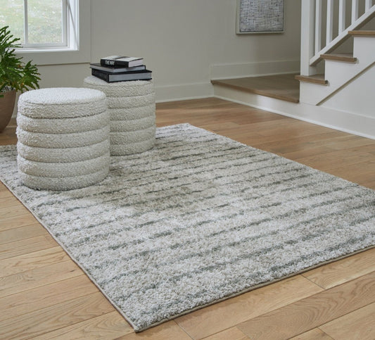 Laddway - Rug Area Rugs by Signature Design by Ashley® - Walls Furniture & Mattress