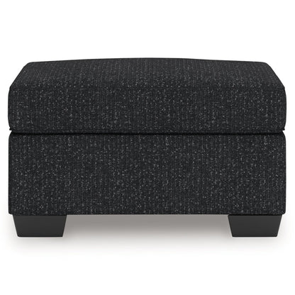Jasmine Peaks - Ottoman - Coal Upholstered Ottomans by Benchcraft® - Walls Furniture & Mattress