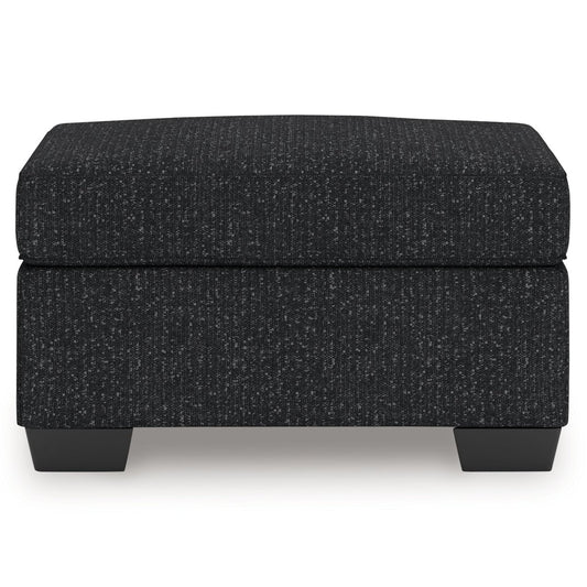 Jasmine Peaks - Ottoman - Coal Upholstered Ottomans by Benchcraft® - Walls Furniture & Mattress