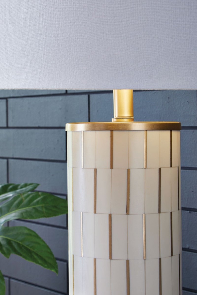 Faridworth - White / Gold Finish - Poly Table Lamp Table Lamps by Signature Design by Ashley® - Walls Furniture & Mattress