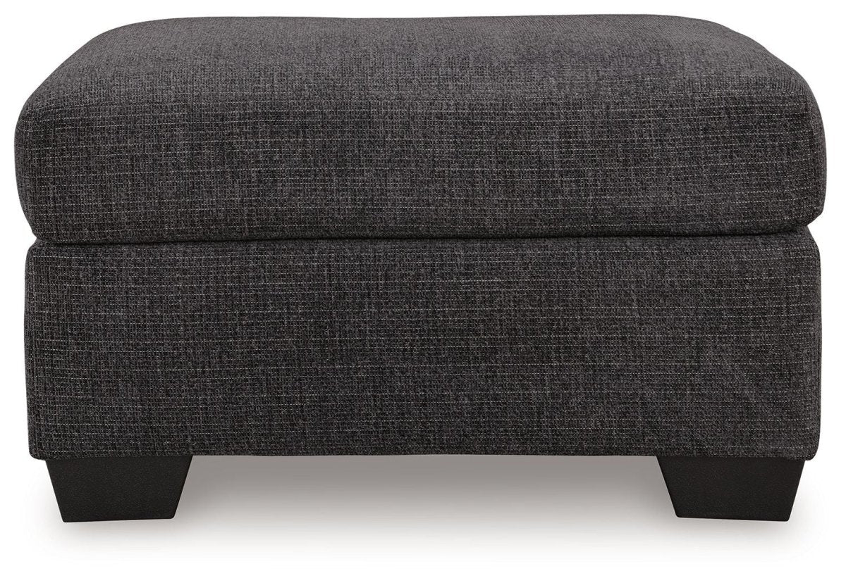 Loreo - Ottoman - Ebony Upholstered Ottomans by Benchcraft® - Walls Furniture & Mattress