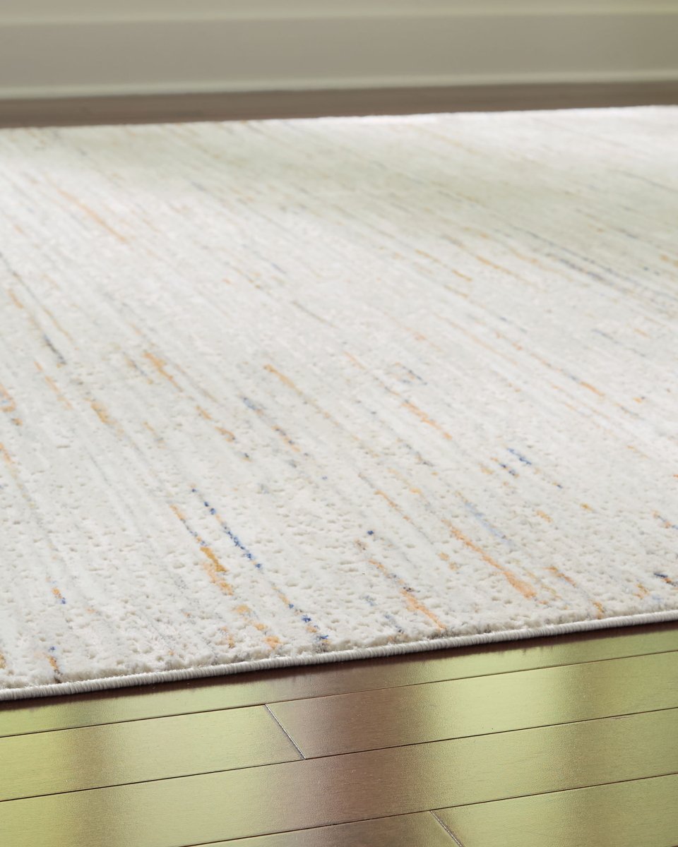 Harjot - Rug Area Rugs by Signature Design by Ashley® - Walls Furniture & Mattress