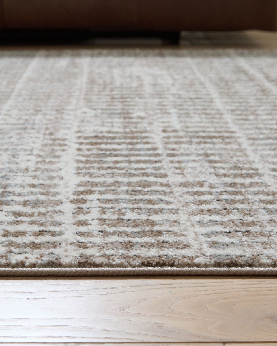 Fuadwick - Rug Area Rugs by Signature Design by Ashley® - Walls Furniture & Mattress