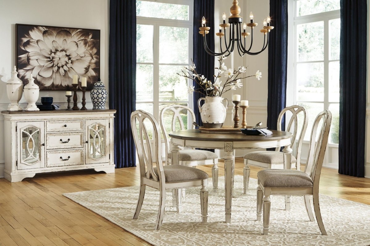 Realyn - Oval Dining Room Extension Table - Chipped White Dining Tables with Extensions by Signature Design by Ashley® - Walls Furniture & Mattress