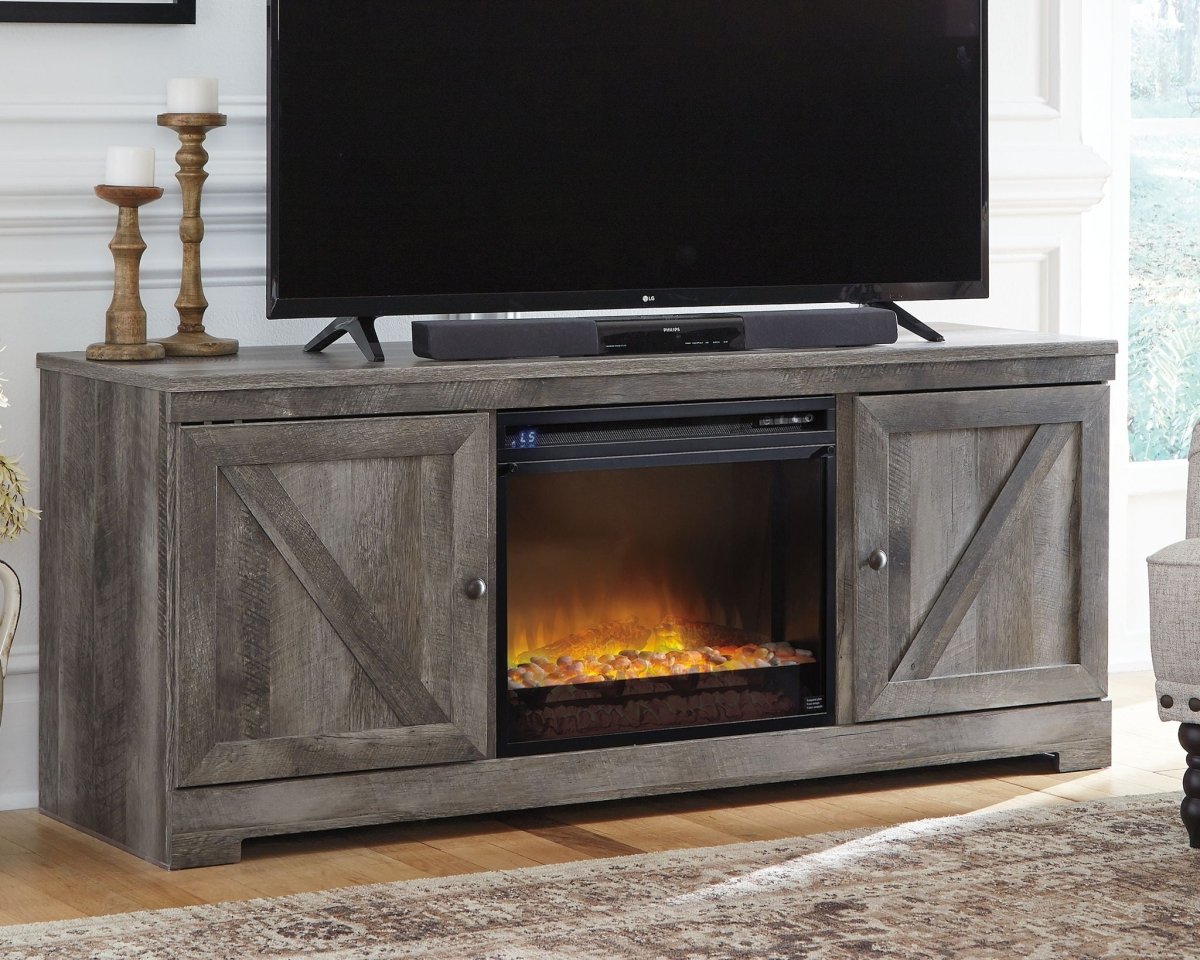 Wynnlow - 63" TV Stand With Glass/Stone Fireplace Insert - Gray Fireplace TV Stands by Signature Design by Ashley® - Walls Furniture & Mattress
