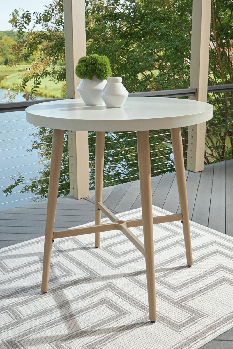 Seton Creek - Round Bar Table With Umbrella Option - Beige Bar Tables by Signature Design by Ashley® - Walls Furniture & Mattress