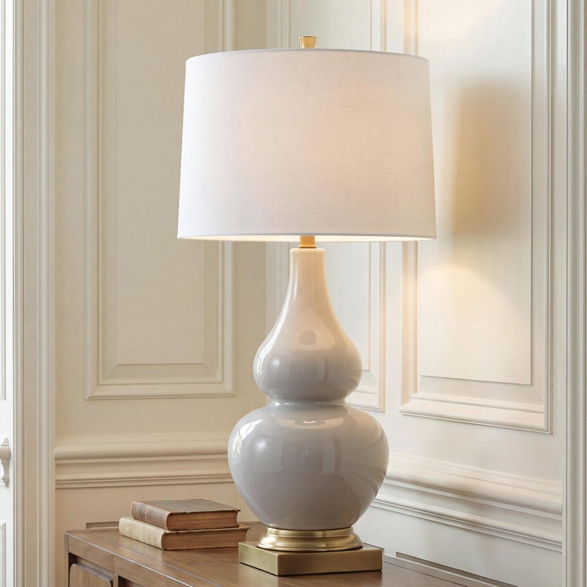 Weswick - Ceramic Table Lamp - Cream / Gold Finish Table Lamps by Signature Design by Ashley® - Walls Furniture & Mattress