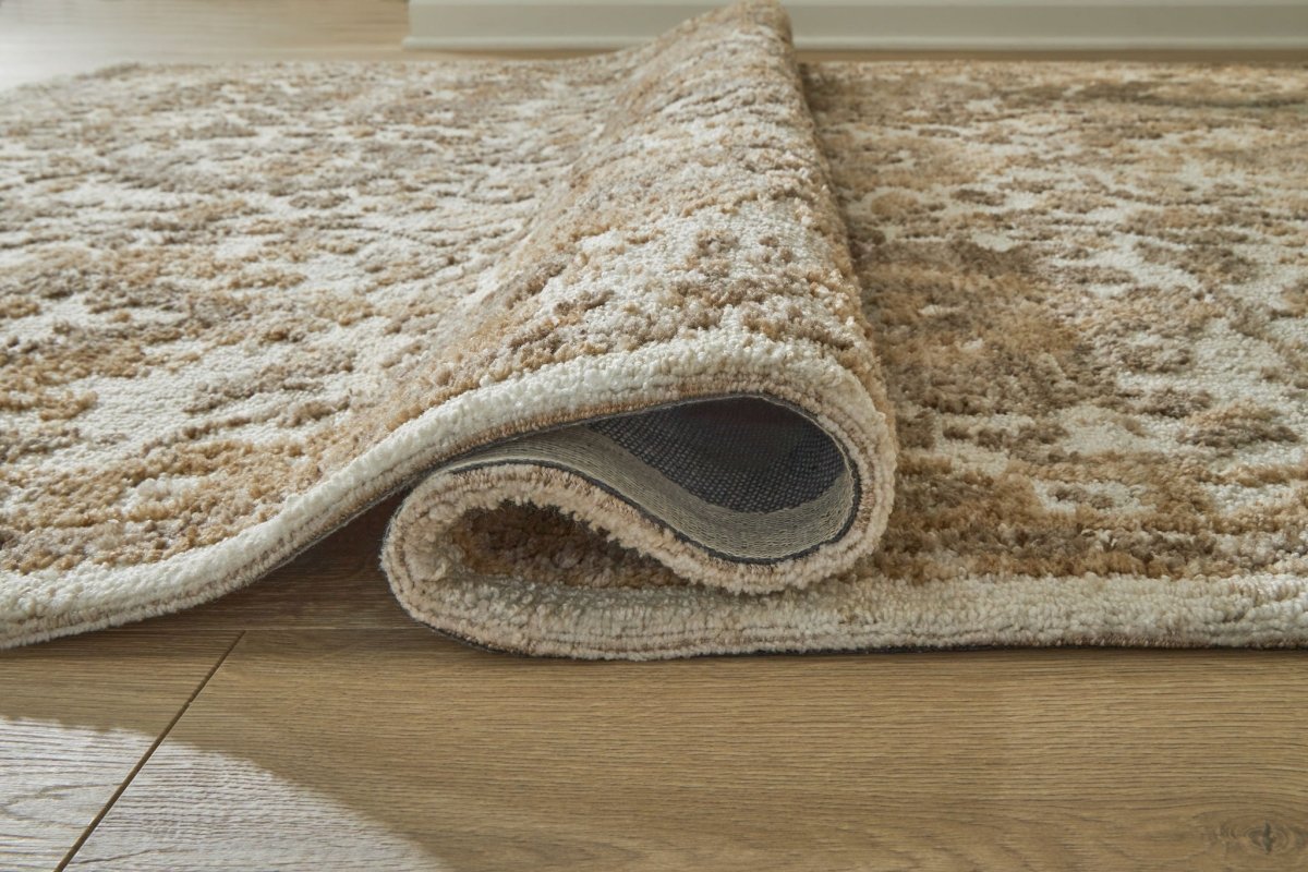 Sableridge - 5' x 7' Rug - Ivory / Taupe / Camel Area Rugs by Signature Design by Ashley® - Walls Furniture & Mattress