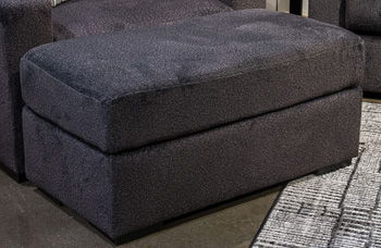 Wryenlynn - Onyx - Ottoman - Fabric Upholstered Ottomans by Signature Design by Ashley® - Walls Furniture & Mattress