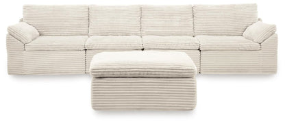 Fannin - 4 - Piece Sectional With Ottoman - Ivory Stationary Sectionals by Signature Design by Ashley® - Walls Furniture & Mattress