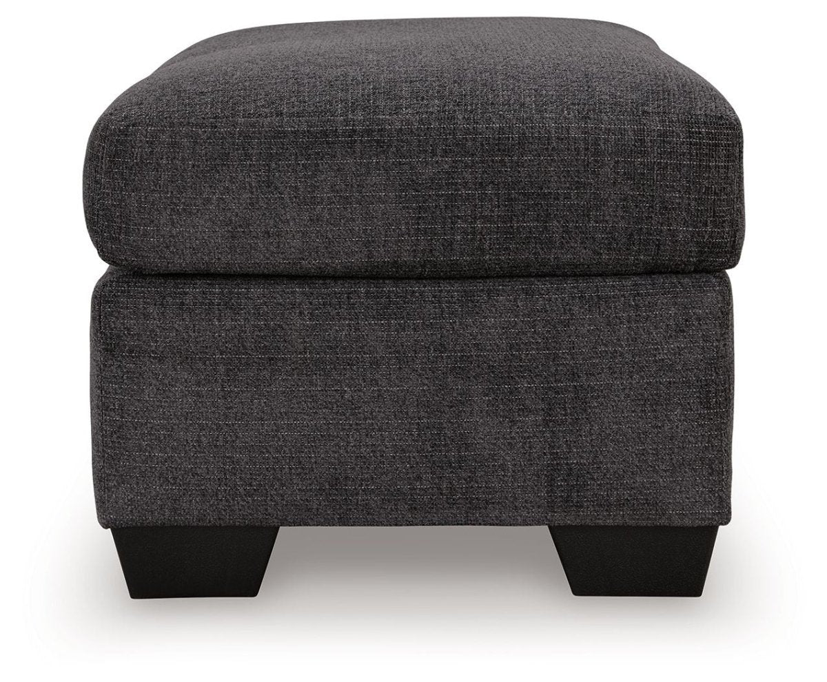 Loreo - Ottoman - Ebony Upholstered Ottomans by Benchcraft® - Walls Furniture & Mattress