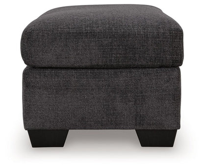 Loreo - Ottoman - Ebony Upholstered Ottomans by Benchcraft® - Walls Furniture & Mattress