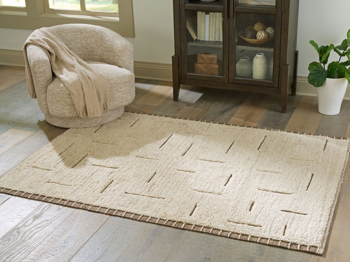 Clayman - Rug Area Rugs by Signature Design by Ashley® - Walls Furniture & Mattress