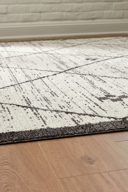 Fenriston - Rug Area Rugs by Signature Design by Ashley® - Walls Furniture & Mattress