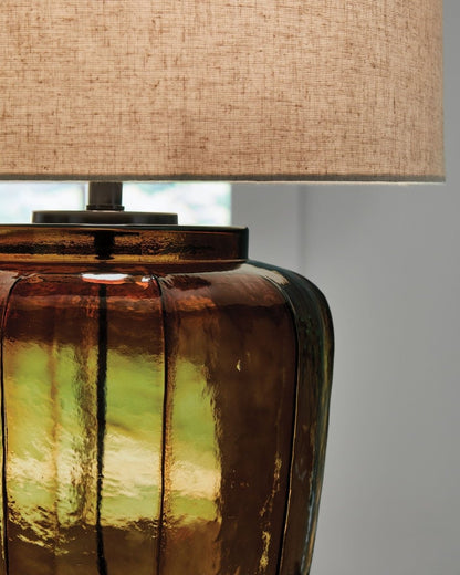 Bainmore - Amber - Glass Table Lamp Table Lamps by Signature Design by Ashley® - Walls Furniture & Mattress