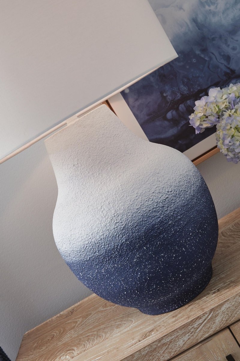 Dashland - Metal Table Lamp - White / Navy Table Lamps by Signature Design by Ashley® - Walls Furniture & Mattress