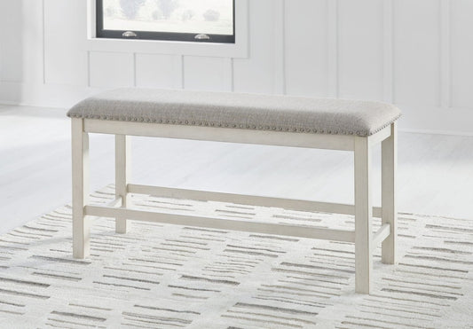Robbinsdale - Dbl Counter Height Upholstered Dining Bench - Antique White Counter Benches by Signature Design by Ashley® - Walls Furniture & Mattress