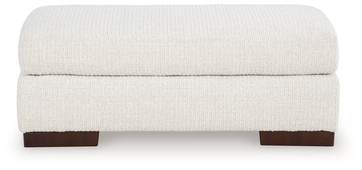 Hartside - Ottoman - Frosted Upholstered Ottomans by Benchcraft® - Walls Furniture & Mattress