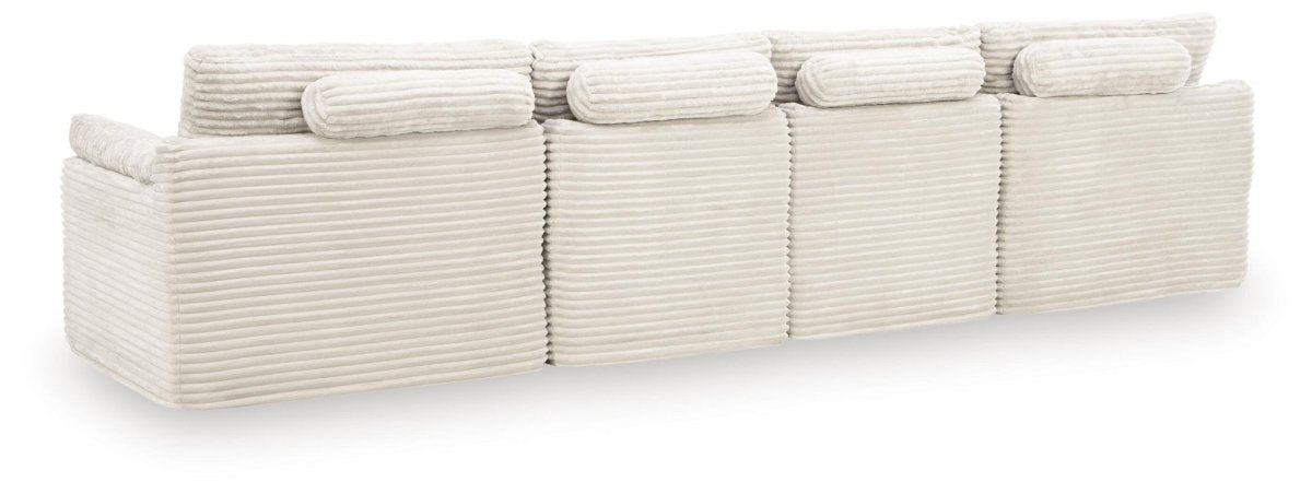 Fannin - 4 - Piece Sectional With Ottoman - Ivory Stationary Sectionals by Signature Design by Ashley® - Walls Furniture & Mattress