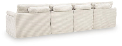 Fannin - 4 - Piece Sectional With Ottoman - Ivory Stationary Sectionals by Signature Design by Ashley® - Walls Furniture & Mattress