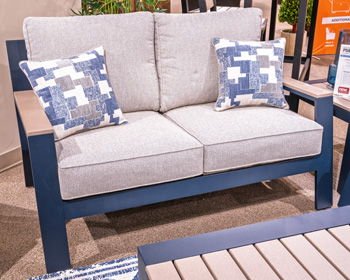 East Beach - Blue - Loveseat With Cushion Loveseats by Signature Design by Ashley® - Walls Furniture & Mattress