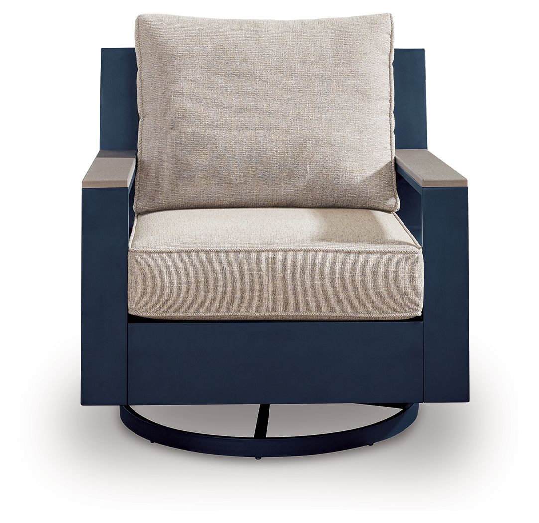 East Beach - Swivel Glider Chair With Cushion - Blue Swivel Chairs by Signature Design by Ashley® - Walls Furniture & Mattress