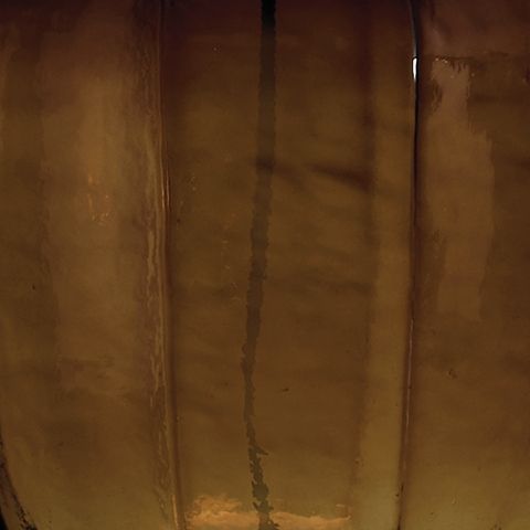 Bainmore - Amber - Glass Table Lamp Table Lamps by Signature Design by Ashley® - Walls Furniture & Mattress