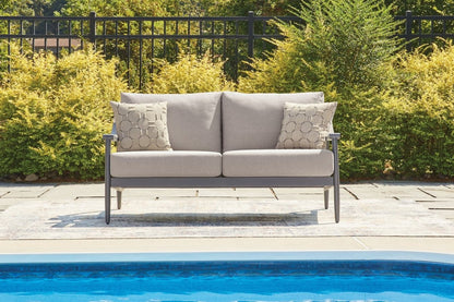 Ocean Beach - Loveseat With Cushion - Gray Loveseats by Signature Design by Ashley® - Walls Furniture & Mattress